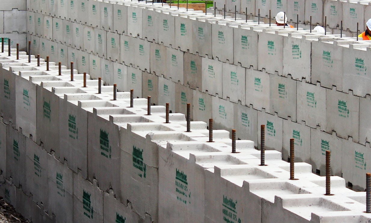 Interbloc precast concrete bund wall under construction