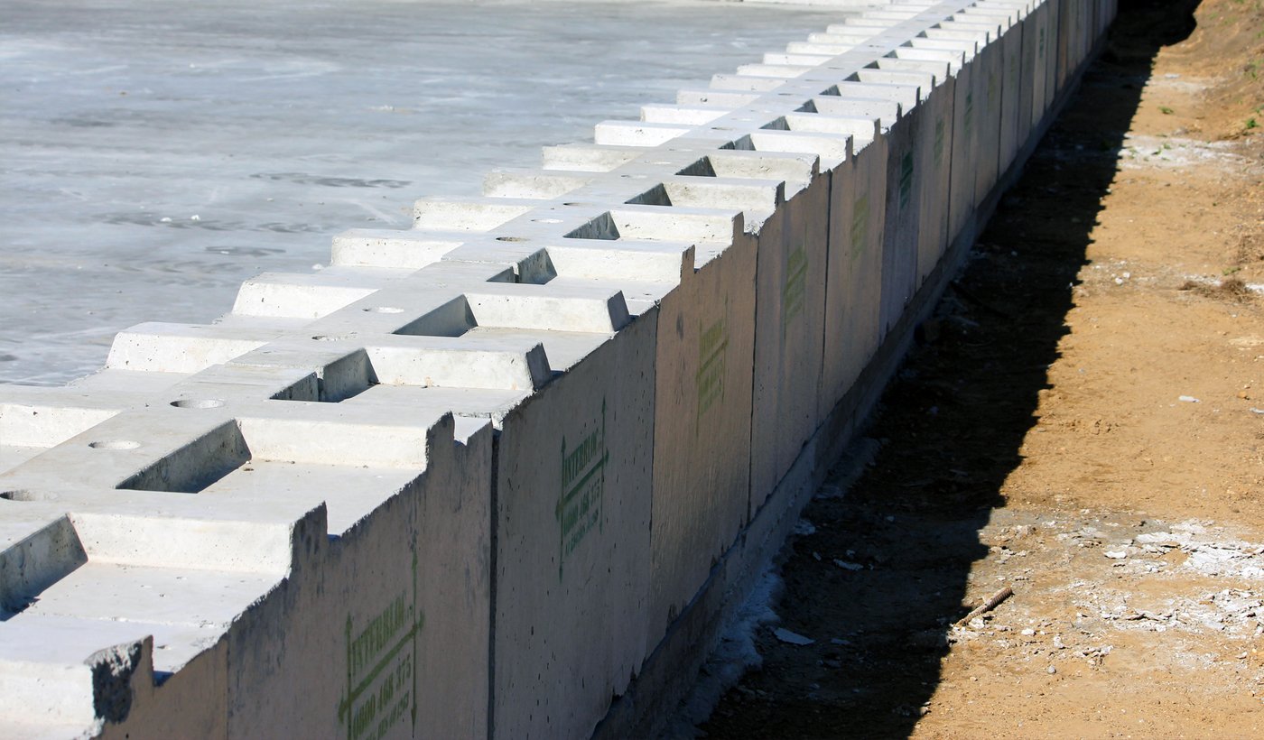 Precast Interbloc retaining wall installed on site