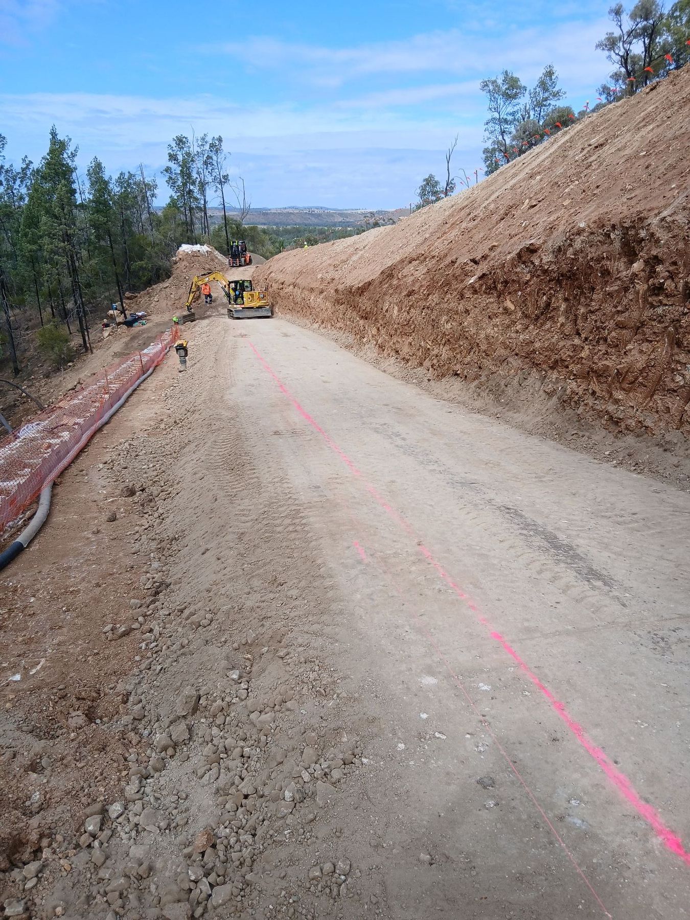 Haul road being cut into remote Queensland bushland ahead of the retaining wall build