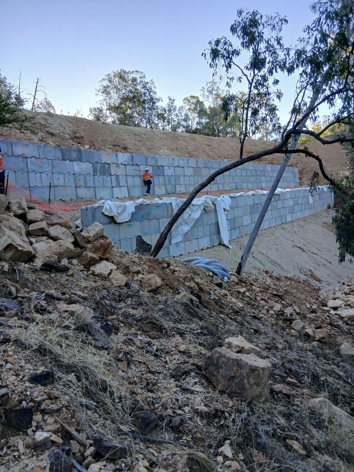Completed tiered Interbloc retaining wall supporting the new haul road at Fairview Resource Reserve