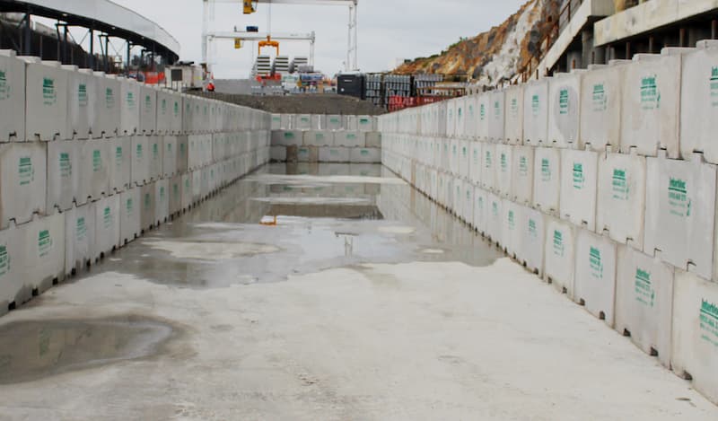 Interbloc settling pond wall under construction for the Waterview Connection project
